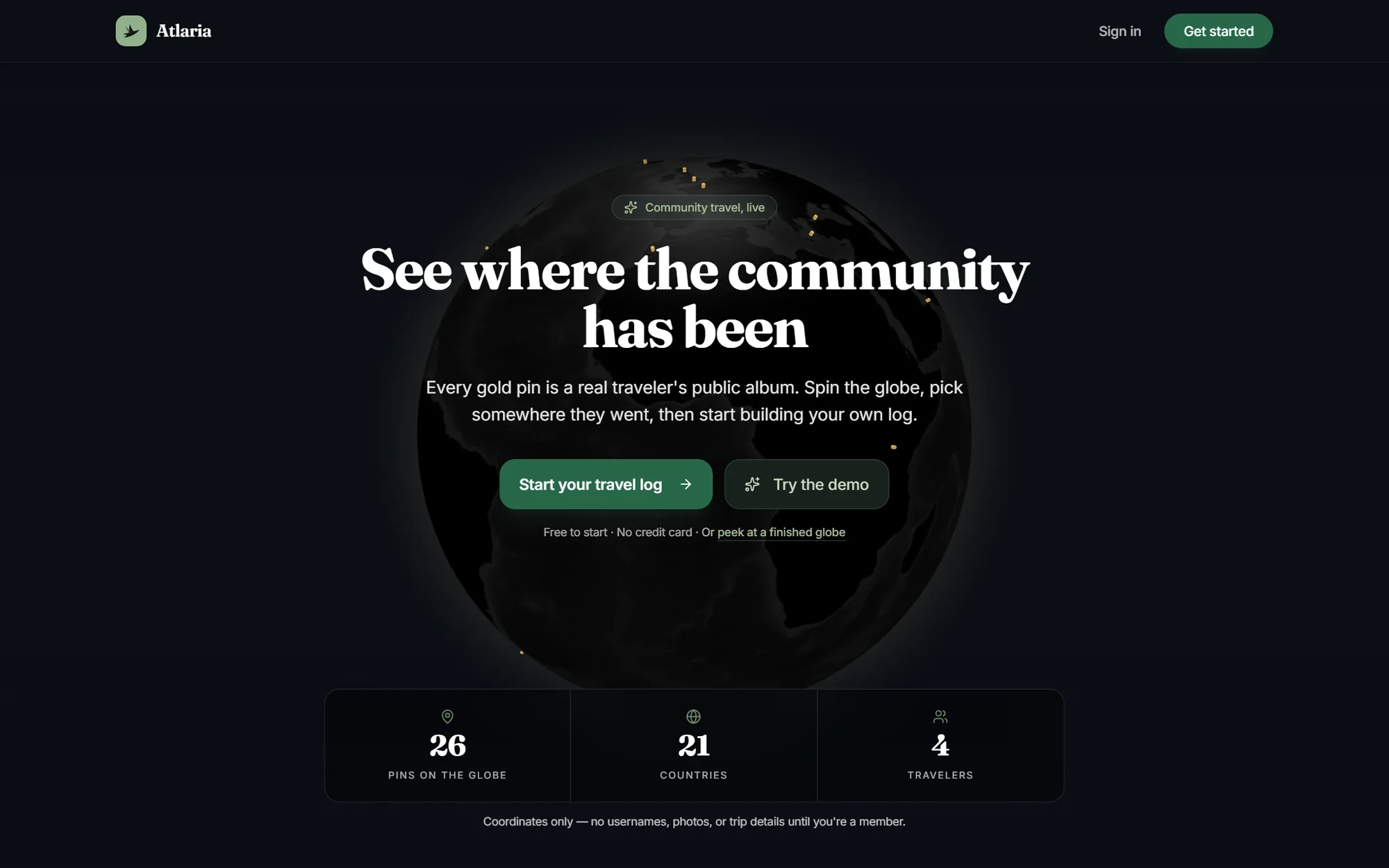 Discover. The community globe with pins, countries and travellers counted.